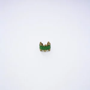 Gold ring with green gemstones on white background.