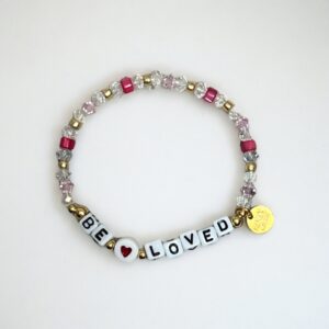 Beaded bracelet with 'BE LOVED' message and charm