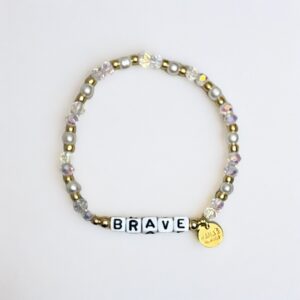 Pearl and crystal "BRAVE" bracelet with charm.