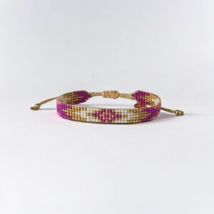 Adjustable purple and gold beaded bracelet.