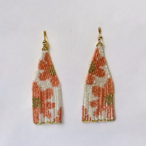 Handmade beaded geometric earrings on white background