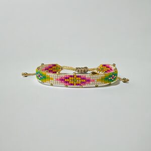 Colorful beaded bracelet on white background.
